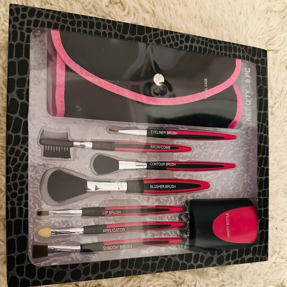 NWT 9PC Makeup Kit (includes travel case, brushes, and a vanity bottle)